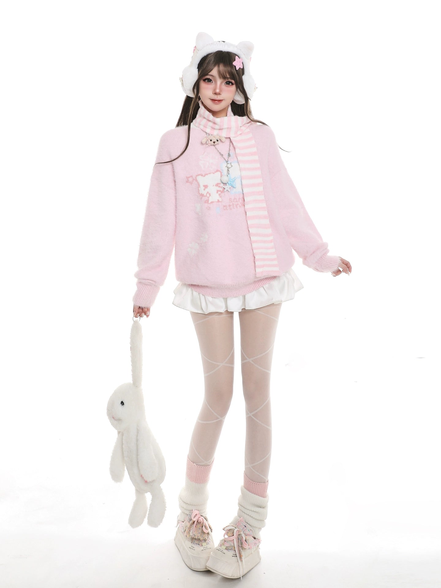 Person wearing a pink outfit with a white bunny toy on a white background