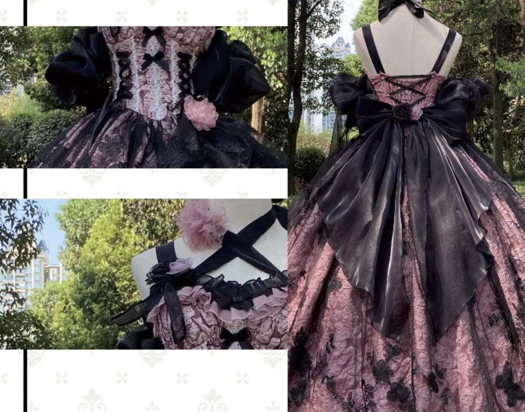 Gothic-style dress with floral details on a mannequin against a natural background.