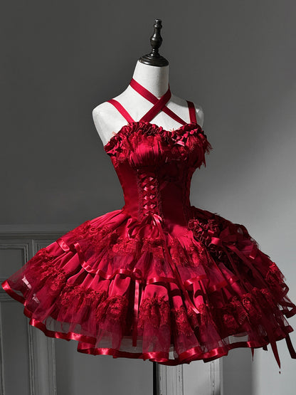 Red gothic-style dress on a mannequin against a gray background
