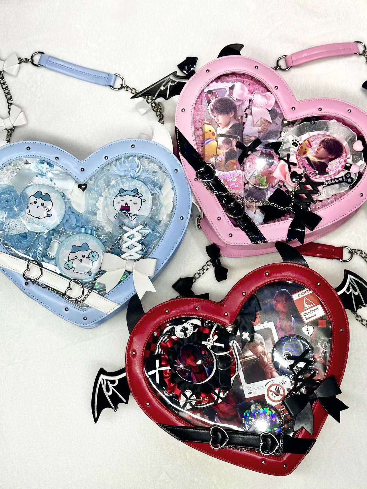 Heart-shaped bags with colorful designs and accessories on a white background