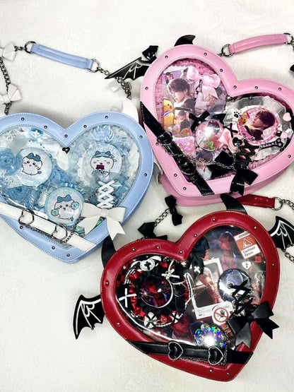 Heart-shaped bags with colorful designs and accessories on a white background