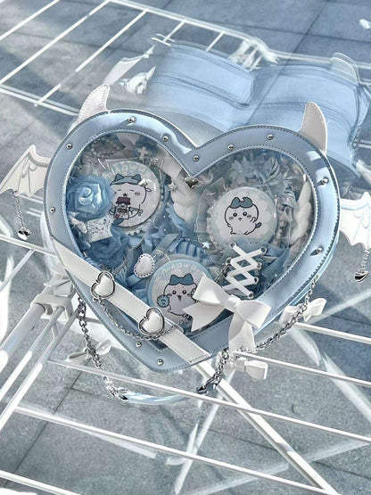 Heart-shaped bag with cartoon characters on a reflective surface