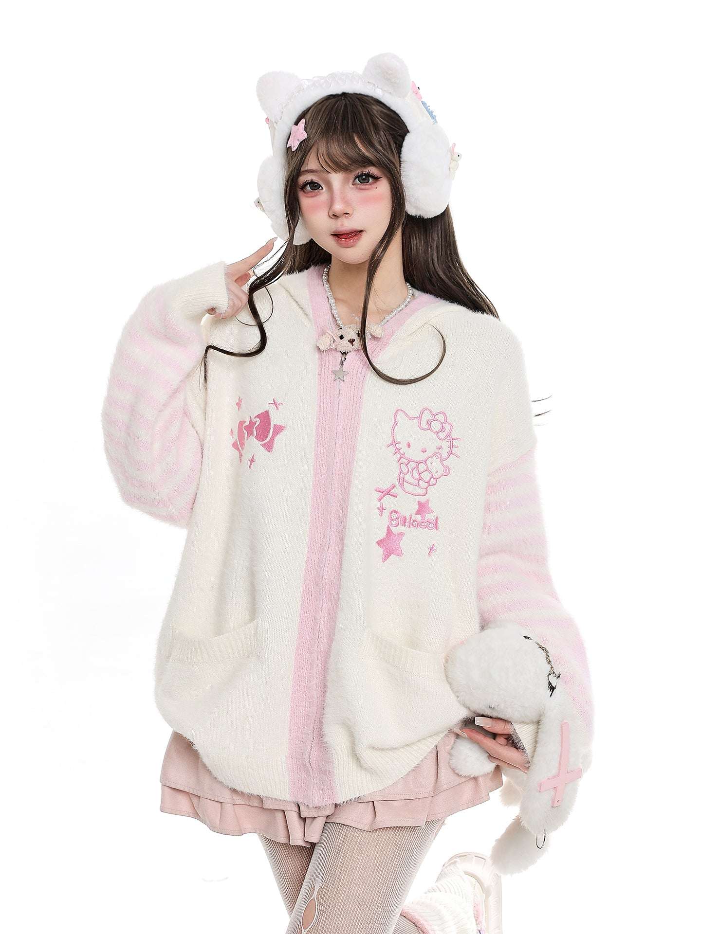 Person wearing a white and pink outfit with cat ears and a fluffy bag on a white background