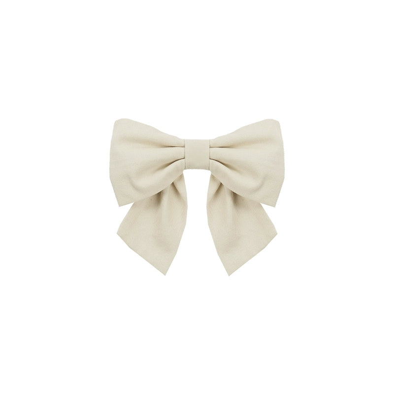Beige bow on a white background
