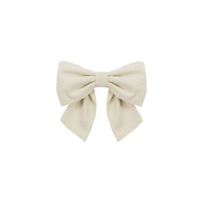 Beige bow on a white background
