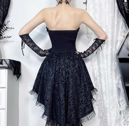 Black lace dress with sheer sleeves on a white background
