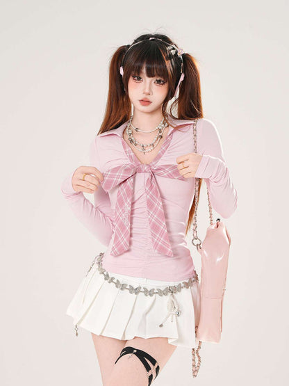 Person wearing a pink outfit with a white background